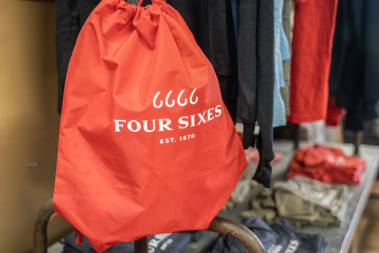 Four Sixes Drawstring Backpack